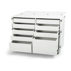 a white dresser with six drawers and four compartments on the top, in front of a white background