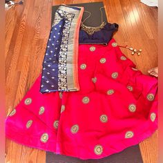 It Comes With A Beautiful Work Blouse You Can Adjust And Tie In The Back The Skirt Is Dark Pink With Embroidered Mandala Designs The Scarf Is Silky And Has Beautiful Designs Stitched On It It Will Fit Teenagers And Adults Who Are 4’11 Or More Message Me With Questions If Needed Traditional Skirt With Dori Work, Traditional Dori Work Skirt, Pink Embroidered Skirt For Parties, Diwali Embroidered Skirt, Embroidered Pink Skirt For Party, Pink Skirt For Party And Navratri, Pink Silk Skirt For Wedding, Pink Fitted Skirt For Festivals, Festive Pink Saree Skirt