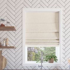 a kitchen window with a roman blind in the middle and shelves on the wall behind it