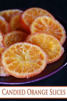 candied orange slices on a plate with the words candied orange slices above them