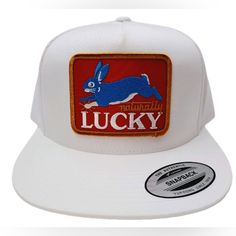 Step Out In Style With Our Handcrafted 'Retro Vintage Style Naturally Lucky Rabbit Trucker Hat Cap.' Made With Care And Pride In The United States, This Classic Fashion Icon Is A Must-Have For Anyone Who Wants To Stand Out From The Crowd. Featuring A Lucky Rabbit Embroidered On The Front, This Hat Is Perfect For Those Who Are "Naturally Lucky." The Iconic Usa Embroidery On The Side Adds To Its Timeless Appeal, Making It An Ideal Accessory For Any Casual Outfit. Crafted From Premium Materials And Retro Snapback Hat With Curved Brim, Retro Snapback Cap, Retro Flat Brim Hat, One Size Fits Most, Retro Trucker Hat With Curved Brim For Spring, Retro Curved Brim Trucker Hat For Spring, Retro Snapback Hat, Adjustable Retro Snapback Hat, Retro Trucker Hat With Short Brim For Spring, Retro Baseball Cap With Curved Brim