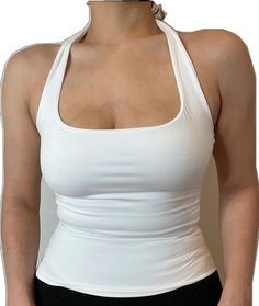 White Halter Neck Camisole With Built-in Bra, Stretch Sleeveless Halter Top With Built-in Bra, Sleeveless Halter Top With Built-in Bra For Workout, Stretch Cami Halter Top Vest, Stretch Cami Halter Top With Vest Detail, White Racerback Vest Crop Top, White Racerback Crop Top Vest, Stretch Sleeveless Halter Top, White Halter Top With Tank Straps For Spring