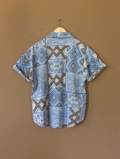 "Authentic vintage short sleeve button down shirt with 90's abstract design and oversized fit. Dates from early to late 90's. This shirt is in great clean condition with little signs of previous wear. Full button down front. Soft 100% cotton. Still has many years of wear left. Measurements (taken zipped/buttoned up and laid comfortably flat) x2 for circumference No Tag Size (Fits like Oversized Large) Shoulders 46\"/48\" Chest 44\" Bottom hem circumference 44\" Sleeve 6\" Top arm circumference 1 Rainbow Striped Shirt, Levis Jeans High Waisted, Prince Shirt, Levis Mom Jeans, Women 90s, Grunge Shirt, Hip Hop Shirts, 90s Hip Hop, 90s Shirts