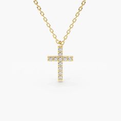 Gold Micro Pave Diamond Cros Necklace Made to Order.	Gold Kt: 14K	Custom Gold Color: Rose Gold, Yellow Gold, White Rhodium	Cross Height & Width: 10 MM X 7.25 MM	Round Diamond: 11 pcs 1.2MM	Total Number of Stones: 11	Total CTW: 0.11 ctw	Diamond Color Clarity: G Color SI Clarity	Setting Type: Micro Pave Layering Diamond Necklaces, Diamond Cross Necklace Gold, Diamond Cross Necklace, Silver Necklace Set, Diamond Cross Necklaces, Gold Cross Pendant, Diamond Cross, Pave Setting, Cross Jewelry