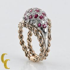 "Amazing Bespoke Ring by Mellerio Dits Meller Features 18k White Gold and Yellow Gold in Intricate Filigree Detailing Includes Asymmetrical White Gold Domed Plaque with Alternating Diamonds and Rubies Hallmarked \"PARIS 991B MELLER\" Dimensions of Plaque = 18 mm Long x 11 mm Wide Size = 4.5 Total Mass = 8.1 grams Amazing, Unique One-of-a-Kind Piece!" Luxury Ruby And Diamond Ring In Yellow Gold, Luxury Ruby Ring With Diamond In Yellow Gold, Platinum Ruby Ring With 17 Jewels, Luxury White Gold Ruby Ring, Luxury Ruby Cluster Ring With 17 Jewels, Luxury Multi-stone Cluster Ring, Elegant Multi-stone Dome Ring For Anniversary, Luxury Ruby Cluster Jewelry, Luxury Yellow Gold Ruby Ring With Brilliant Cut