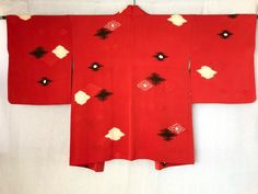 A vintage Japanese red Haori Kimono jacket. Fits a USA woman size M-L. Express ship included.   This vintage Japanese cardigan will take you easily from day to evening wear...just add the lipstick!   MATERIAL:  Matte synthetic with Shibori tie dye.  Cherry blossom synthetic interior. COLOR:  Slightly orange-ish-red, rust, dark-burgundy, pale-peach & cream. CONDITION:  Used, vintage.  Great condition, but NO ties for closing robe at chest. Kimono are DRY CLEAN only. My shop: https://kimonomemoirs Vintage Red Long Sleeve Outerwear, Traditional Red Cardigan For Winter, Traditional Red Winter Cardigan, Traditional Red Winter Kimono, Red Haori, Japanese Cardigan, Male Kimono, Peach Cream, Shibori Tie Dye