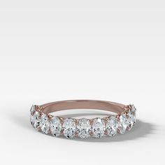 This Petite Shared Prong Wedding Band with Oval diamonds is perfect for those that want something a bit more subtle. The 3.5mm wide band consists of tiny oval cut diamonds with a petite shared prong setting that allows maximum sparkle with minimal bulk. 3.5 mm band available in rose, yellow and white gold