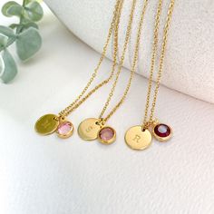 Birthstone necklace for women in gold-tone stainless steel consisting of a 12mm medallion personalized by hand with the initial and 8mm birthstone of your choice (1 character per medallion). ♡ DETAILS * Material: Gold stainless steel * Necklace length: 45 cm + 5 cm extension chain * Character height: 3 mm * Character type: Uppercase * Clasp: Carabiner ♡ CARE TIPS We advise you to avoid contact with water, perfume and chemicals to ensure long life. ♡ PROCESSING & DELIVERY Orders are processed and Minimalist Gold Birthstone Necklace With Charms, Gold Stainless Steel Jewelry With Birthstone, Gold-toned Stainless Steel Jewelry With Birthstone, Dainty Gold Birthstone Necklace With Initials, Gold Name Necklace With Charms For Mom, Gold Name Necklace With Charms As Gift For Mom, Customizable Gold Birthstone Necklace Gift For Mom, Personalized Minimalist Birthstone Necklace For Mom, Mother's Day Gift Birthstone Necklace With Round Pendant