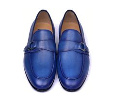 Corrente Leather Side Buckle Loafer Blue Elegant, Italian Calfskin Leather slip-on Side Buckle Loafer from the Corrente collection features soft Calfskin lining, a clean welt and a full Leather Sole with Rubber Insert for Increased Comfort! Elegant Blue Slip-on Moccasins, Classic Blue Slip-ons For Business, Blue Semi-formal Round Toe Moccasins, Luxury Blue Monk Strap Shoes For Formal Occasions, Classic Blue Monk Strap Shoes With Leather Sole, Blue Slip-on Moccasins For Semi-formal Occasions, Classic Blue Moccasins With Leather Sole, Classic Blue Moccasins For Business, Elegant Blue Slip-ons For Formal Wear