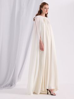 WF ATELIER Model height: 177 CM 100% Polyester Length: 145 cm White Cape Dress, White Cape, Dress Art, Circle Dress, Arab Fashion, Cape Dress, Dress Store, Art Dress, Clothes Ideas