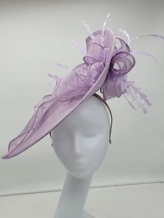 Beautiful lavender stiffened sinamay Fascinator. This vibrant colors will add elegance to any,  bridesmaid,  rehearsal dinner,  Wedding guest,  cocktail party, or church - Ready to ship  - Lightweight - Free Shipping - Fast shipping - Customize by adding different color flowers and or feathers Check my store for styles and colors.  Hatsandpearls.etsy.com Find more at my website: Www.hatsandpearls.com  Reach out to me if you can't find what you are looking for.  I can make cake custom orders and help you style and match your outfit  Tag and share your pictures when you wear and style our hats.  Instagram: @hats_pearls Facebook: Hats Pearls Thank you for visiting and happy shopping! Luxury Purple Feathered Fascinator, Spring Party Sinamay Headpiece, Spring Party Headpieces In Sinamay, Kentucky Derby Sinamay Headpiece For Party, Kentucky Derby Party Headpiece In Sinamay, Fitted Fascinator For Royal Ascot Party, Elegant Fascinator For Royal Ascot Church, Elegant Fascinator For Church And Royal Ascot, Royal Ascot Sinamay Fascinator For Party