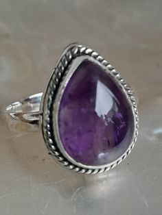 Ring made of 925 sterling silver with a beautiful, clear, teardrop-shaped amethyst. The ring size is 58, the stone measures approx. 1.6 cm long and approx. 1.2 cm wide. The elegant amethyst * stands for: harmony, positivity, calm, concentration * protection against: restlessness, headaches and is the main stone for the zodiac sign Pisces. Zodiac Signs Pisces, Solitaire Ring, Sterling Ring, Sterling Silver Rings, Amethyst, Ring Size, Jewelry Rings, 925 Sterling Silver, Sterling Silver