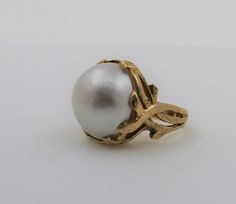 14K yellow gold round shaped real pearl ring with a matte finish. Gorgeous pearl fashion ring. This classic ring would be a great addition to anybody's collection. Ring size: 5.5 Pearl measures approx: 20.4mm X 19.2mm Total ring weight: 11.5g Will be placed into a suitable gift box. Free shipping within the U.S. Big Pearl Ring, Pearl Fashion, Ring Fashion, Real Pearls, White Band, Fashion Ring, Cute Charms, Classic Ring, Pearl Ring