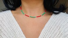 14 inch green and red necklace with pearl accents. Available in different colour combinations (upon request). Knotted Bracelets, Red Beaded Necklace, Necklace With Pearl, Red Beaded Necklaces, Green Beaded Necklace, Red Necklace, Gold Pearl Necklace, Knot Bracelet, Colour Combinations