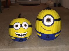 two pumpkins decorated to look like minion faces