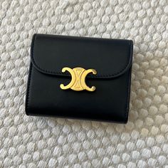 Used A Few Times, Celine Triomphe Small Flap Wallet Elegant Everyday Wallets With Gold-tone Logo Plaque, Elegant Bifold Wallet With Gold-tone Logo Plaque, Designer Tan Wallet For Evening, Luxury Black Wallets With Gold-tone Hardware, Elegant Tan Evening Wallet, Celine Triomphe, Celine Wallet, Celine Bags, Limited Time