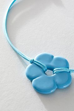 Add a sweet touch to your neck with this statement glass flower choker. **Features:** Choker style, double-strand waxed cord, glass flower pendant, adjustable clasp closure **Why We | Baby Flower Cord Choker by Free People in Blue Adjustable Blue Necklace With Flower Charm, Cord Choker, Flower Choker, Baby Flower, Choker Style, Jade Green, Flower Pendant, Blue Stone, Boho Outfits