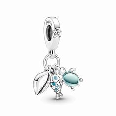 Go on a snorkeling adventure and meet the beautiful creatures of the dreamy deep blue sea with this ocean-themed triple dangle charm. This trio of sterling silver dangle charms includes a conch shell, a scaled fish with turquoise enamel detailing and a sea turtle with two-toned blue and green Murano glass as its shell. The bail features a tiny raised starfish and the messages "Explore" and "Dream", reminding you to seek your next adventure, wherever that might be. Ocean-inspired Jewelry With Dangling Charms For Gifts, Ocean-inspired Silver Charms Jewelry, Ocean-inspired Dangle Charms Jewelry, Ocean-inspired Starfish Dangle Jewelry, Pandora Armband, Diy Jewelry Gifts, Charms Pandora, Fish Sea, Bracelet Pandora