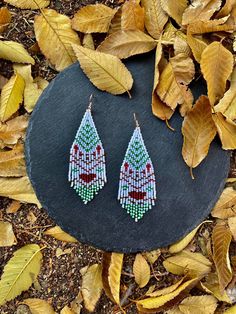 Christmas chic earring- Handwoven beaded earrings, modern earrings, christmas, festive, statement earrings, fringe earrings, gift for her ♥𝑀𝑎𝑑𝑒 𝑢𝑠𝑖𝑛𝑔 𝑓𝑟𝑒𝑒ℎ𝑎𝑛𝑑 𝑏𝑒𝑎𝑑𝑖𝑛𝑔 𝑤𝑜𝑣𝑒𝑛 𝑡𝑒𝑐ℎ𝑛𝑖𝑞𝑢𝑒𝑠 𝑤𝑖𝑡ℎ 𝑠𝑡𝑟𝑜𝑛𝑔 𝑠𝑦𝑛𝑡ℎ𝑒𝑡𝑖𝑐 𝑡ℎ𝑟𝑒𝑎𝑑. ♥𝑇ℎ𝑒 𝑠𝑖𝑧𝑒 𝑜𝑓 𝑡ℎ𝑒 𝑠𝑒𝑒𝑑 𝑏𝑒𝑎𝑑𝑠 𝑢𝑠𝑒𝑑 𝑖𝑠 2 𝑚𝑖𝑙𝑙𝑖𝑚𝑒𝑡𝑒𝑟𝑠 𝑎𝑛𝑑 𝑏𝑒𝑎𝑑𝑠 𝑎𝑟𝑒 ℎ𝑖𝑔ℎ 𝑞𝑢𝑎𝑙𝑖𝑓𝑖𝑒𝑑. ♥𝐴𝑙𝑙 𝑡ℎ𝑒 ℎ𝑜𝑜𝑘𝑠 𝑢𝑠𝑒𝑑 𝑖𝑛 𝑜𝑢𝑟 𝑗𝑒𝑤𝑒𝑙𝑟𝑦 𝑎𝑟𝑒 24 𝑘 𝑔𝑜𝑙𝑑 𝑝𝑙𝑎? Beaded Fringe Teardrop Earrings As Gift, Handwoven Chandelier Dangle Earrings As Gift, Handmade Bohemian Beaded Earrings For Christmas, Bohemian Handmade Beaded Christmas Earrings, Handmade Teardrop Tassel Earrings For Gift, Handwoven Tassel Drop Earrings As A Gift, Handwoven Tassel Drop Earrings For Gift, Bohemian Christmas Dangle Earrings, Handmade Festive Tassel Earrings