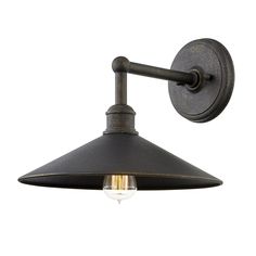 an old - fashioned wall light with a black metal finish and glass bulb on the side