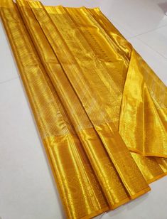 KANCHIPURAM PURE SILK HANDLOOM SAREE WITH 2 GRAM PURE JARI SILK MARK CERTIFIED  ❗️❗️❗️PLEASE CONTACT SELLER TO CONFIRM  FOR AVAILABILITY ️❗️ Upon request: Tussels, fall and pico and blouse work (Aari work and Maggam work) will be done with extra charges  Excellent quality with beautiful colours and combinations. Gold Anarkali With Traditional Drape, Gold Anarkali Traditional Wear With Traditional Drape, Gold Traditional Wear With Cutdana For Transitional Season, Gold Anarkali Traditional Wear For Navratri, Transitional Gold Traditional Wear With Traditional Drape, Transitional Gold Traditional Wear For Wedding, Gold Anarkali Traditional Wear With Cutdana, Gold Traditional Wear With Zari Work For Navratri, Gold Saree For Transitional Season With Traditional Drape