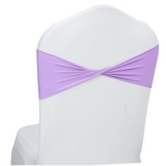 the back of a white chair with a purple sash on it's headband