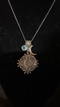 Beautiful detailed silver tone photo locket. One inch in diameter on a lovely 24 inch curb chain. has accent crescent moon and a lovely aquamarine colored bead. This would be an amazing addition to your jewelry as well as an awesome gift for a loved one. Necklace Moon, Aquamarine Colour, Thank You Photos, Memory Locket, Wichita Ks, Split Rings, Grandma Gift, Photo Locket, Moon And Stars