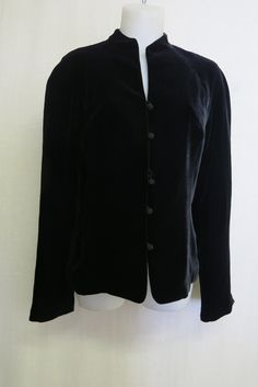 "Goth Black Velvet Ann Taylor Jacket What a very elegant garment! Just Dreamy! Perfect to top off your dressy outfit Satin lined with lovely frog type buttons This is a beautiful, beautiful garment... Rayon and silk...very fine and soft Excellent, like new condition Made in USA Size 10 Medium Soft dropped shoulder 38\" waist 38\" bust 23\" Length 18\" sleeve from underarm https://www.etsy.com/shop/BelindasStyleShop" Elegant Single Breasted Blazer With Stand Collar, Elegant Blazer With Covered Buttons And Stand Collar, Elegant Blazer With Button Closure And Stand Collar, Fitted Stand Collar Blazer With Buttons, Elegant Long Sleeve Blazer With Covered Buttons, Classic Party Outerwear With Button Closure, Long Sleeve Outerwear With Button Closure For Evening, Winter Evening Blazer With Buttons, Elegant Fitted Outerwear With Stand Collar