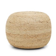 a large round woven poufce on a white background