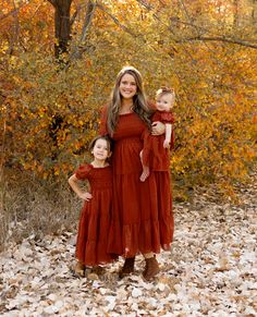 ITEM DESCRIPTION Get ready for fall family outings with our adorable matching dresses! Designed for comfort and style, these dresses are perfect for cozy pumpkin patches, festive gatherings, family fall pictures or simply enjoying the crisp autumn air together. 🍁💖Swipe to see all the beautiful details and color that will make this season extra special! DETAILS: Fit type: True to size Color: Rust-Brown Fit Style: Long Tiered Dress Flowy Length: Calf Long Dress Material: 100% Polyester Versatile tie bow that can be used in the front or back This dress includes lining Front and back smocked bodice Accessories not included SIZING ADULT S: Chest 30" | Waist 24.4"| Length: 39.8"| Sleeve length: 15" M: Chest 31.5" | Waist 26.4"| Length: 40.7"| Sleeve length: 15.3" L: Chest 33" | Waist 28.4"| Le Family Fall Pictures, Long Tiered Dress, Mommy Daughter Photos, Mama And Mini, Get Ready For Fall, Family Outings, Pumpkin Patches, Mommy And Me Dresses, Crisp Autumn