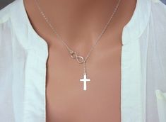 Infinity Cross Neckalce - Sterling Silver Cross Lariat Necklace - Infinity Cross Necklace - Christening gifts - Christening gifts for girls by rainbowearring on Etsy https://www.etsy.com/listing/263670177/infinity-cross-neckalce-sterling-silver Nickel-free Silver Infinity Jewelry, Sterling Silver Cross Necklaces For Mother's Day, Silver Cross Jewelry For Mother's Day, Silver Infinity Clavicle Chain Jewelry, Silver Cross Pendant Jewelry For Mother's Day, Silver Charm Necklace For Her, Mother's Day Sterling Silver Cross Pendant Jewelry, White Gold Cross Jewelry For Mother's Day, Mother's Day Sterling Silver Cross Pendant