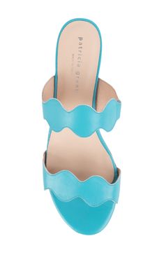 Scalloped straps and a covered block heel define a Spanish slide sandal made with a comfortably cushioned footbed. 2" heel (size 8.5) Cushioned footbed Leather upper and lining/rubber sole Made in Spain Women's Shoes Chic Turquoise Sandals For Summer, Spring Turquoise Open Toe Heels, Chic Turquoise Open Toe Sandals, Turquoise Synthetic Sandals For Spring, Green Summer Mules With Removable Insole, Turquoise Open Toe Heels For Spring, Turquoise Beach Sandals With Removable Insole, Turquoise Sandals With Removable Insole For Beach, Green Synthetic Sandals With Stacked Heel