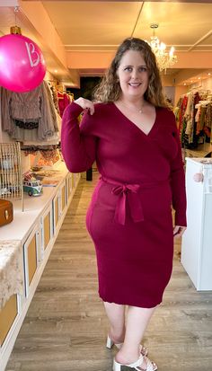 Plus size solid ribbed sweater dress featuring a surplice neckline, body contouring with self-tie around waist. 75% viscose, 25% nylon Fall Wrap Dress With Surplice Neckline For Brunch, Fall Surplice Neckline Wrap Dress For Brunch, Surplice Neckline Wrap Dress For Fall Brunch, Fall Wrap Dress With Tie Waist For Brunch, Fitted Fall Wrap Dress For Brunch, Fitted Wrap Dress For Fall Brunch, Fall Brunch Fitted Wrap Dress, Plum Sweater, Ribbed Sweater Dress