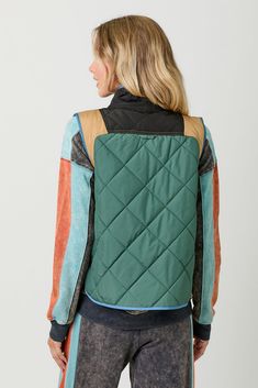 This quilted vest keeps you warm without weighing you down. Convenient side pockets and stylish color blocking in green, camel, blue, and black make it a versatile and functional addition to your wardrobe. Perfect for layering and adding a pop of color to any outfit. 100% Polyester Green Patchwork Outerwear For Outdoor Activities, Green Color Block Nylon Outerwear, Green Nylon Color Block Outerwear, Green Vest Outerwear For Fall, Green Quilted Outerwear For Outdoor Activities, Quilted Green Outerwear For Outdoor Activities, Quilted Vest For Layering In Fall, Casual Color Block Outerwear For Layering, Quilted Functional Vest For Fall