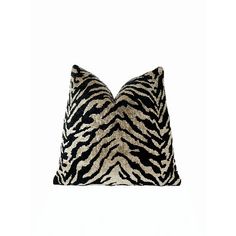 a zebra print pillow on a white background