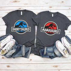 two t - shirts with the words daddysauruss and an image of a dinosaur