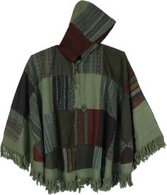 Thick weave heavy weight cotton unisex patchwork poncho in Himalayan green tones.  This poncho features a hoodie with ties, a button-front design and fringes at bottom. #tlb #Patchwork #Fringe #vacationclothing #Jacket #Striped #bohemianfashion #Handmade #XLPlus #PatchworkPoncho #EasternStylePoncho #HoodedPoncho #FestivalPoncho Green Hooded Poncho For Winter, Green Hooded Winter Poncho, Winter Green Hooded Poncho, Hooded Cotton Poncho For Festival, Green Long Sleeve Casual Poncho, Casual Green Long Sleeve Poncho, Poncho Aesthetic, Male Cottagecore Outfits, Primitive Clothing