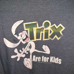 Trix Are For Kids, T-Shirt, Clor Might Be Slightly Different. Is A Blue Gray Color 90s Gray Graphic Print Top, 90s Style Gray Graphic Print Top, 90s Style Blue T-shirt With Text Print, Fun Crew Neck Top With Logo Print, 90s Blue Logo Print T-shirt, Blue Retro Shirt With Funny Print, Retro Blue Shirt With Funny Print, 90s Blue T-shirt With Text Print, Blue Gray Color