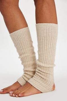 Sure to be the coolest addition to your accessories collection, these totally timeless legwarmers are featured in a sleek, ribbed knit fabrication and toe-less, heel-less style for the perfect wear-anywhere style. | Ribbed Stirrup Legwarmers by Hansel From Basel at Free People in White Stirrups, Accessories Collection, Basel, Boho Clothing, Ribbed Knit, Free People, Sleek, Luxury Fashion, Cream