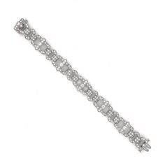 Slim vintage and Art Deco inspired diamond platinum bracelet. Adorned with white round cut diamonds in 6.18 carat total. Diamonds are all natural in G-H Color Clarity VS. Platinum 950 metal. Length: 17.2 cm Width. 1.2 cm Weight: 28.4 g [shortcode] [video] [/video] [/shortcode] Diamond Chandelier, White Gold Hoop Earrings, Platinum Bracelet, Retro Bracelet, White Gold Hoops, Platinum Earrings, Art Deco Bracelet, 18k Gold Jewelry, Sapphire Bracelet