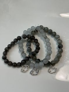 comes in glass beads & crystals Gray Beaded Bracelet, Natural Bead Bracelets, Adjustable Gray Bracelet With Faceted Beads, Gray Adjustable Bracelets With Faceted Beads, Elegant Gray Round Bead Bracelets, Adjustable Gray Bracelets With Faceted Beads, Elegant Gray Round Beads Bracelets, Elegant Gray Stretch Bracelet As Gift, Gray Faceted Beaded Bracelets As Gift