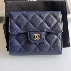 Chanel Trifold Compact Flap Wallet Caviar Navy Shw Made In Spain Excellent Used Brand New Condition In Mint (Pristine) No Flaws To Report Includes Everything: Dust Bag, Box And Authentication Card No Signs Of Wear And Tear. Length: 4.5 In Width: 0.5 In Height: 4 In Open For Offers But No Lowballing Please Happy Shopping Ladies!! Chanel Flap Wallet, Luxury Blue Wallet For Formal Occasions, Designer Blue Wallet For Formal Occasions, Blue Leather Wallets For Formal Occasions, Elegant Compact Leather Wallet, Designer Blue Wallets For Formal Occasion, Blue Leather Formal Wallets, Formal Blue Leather Wallet, Formal Blue Wallet With Card Slots