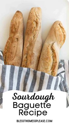 four baguette breads in a striped cloth with text overlay saying, sourdough baguette recipe