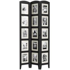 a black and white room divider with pictures on it