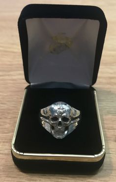 "Amazing Marine Corps Skull Ring with EGA located on the forehead of the skull. Available in sterling silver, 10k or 14k gold *Every ring we design and handcraft is made by a Marine Corps Veteran at our shop in Lakewood, Colorado - Proudly Made in USA. *Amazing Custom Marine Corps Ring made by a USMC Veteran. Officially licensed and approved by the US Marine Corps! *MADE BY A MARINE FOR MARINES! (TM) *These USMC Rings are Solid, bold, powerful and of substantial weight! Durable and Marine Tough! Gift White Gold Hallmarked Skull Ring, Sterling Silver Skull Jewelry With Polished Finish, Formal White Gold Skull Ring, Sterling Silver Skull Ring In White Gold, Collectible Sterling Silver Skull Ring, Sterling Silver Skull Ring Collectible, Hand Cast Sterling Silver Skull Ring, Sterling Silver Skull Ring With Engraving, Engraved White Gold Skull Ring In Sterling Silver