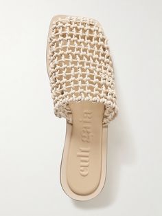 Find CULT GAIA Merida Woven Leather Mules on Editorialist. Cult Gaia's 'Merida' mules are hand-knotted from strips of smooth leather to create a crochet-like appearance. They have cushioned soles for comfort and rest on cylindrical 30mm wooden heels. Wear yours with a breezy coverup on the beach. Woven Leather Shoes, Wooden Heels, Crochet Sandals, Woven Shoes, Cult Gaia, Wooden Heel, 2024 Fashion, Leather Mules, Metallic Leather