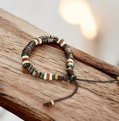 Check out our handcrafted natural stone beaded bracelet, perfect for both men and women! With its vibrant multicolor beads, it's a great way to add a pop of color to your everyday style.  The adjustable length makes it super comfy for all wrist sizes, so you can wear it casually or layer it with other pieces.  Made from high-quality natural stones, this unisex bracelet gives off a laid-back vibe while making a unique style statement. Whether you're dressing up or keeping it casual, this versatile piece is a must-have for anyone who loves earthy jewelry! INTERNATIONAL ORDERS: It is commonly understood that duties or customs charges will be incurred on international orders. It is the policy of this shop that the purchaser will be responsible for paying these customs charges. Earthy Multicolor Gemstone Beaded Bracelets, Earthy Multicolor Round Beads Bracelets, Earthy Multicolor Beaded Bracelets With Natural Stones, Earthy Multicolor Beaded Bracelet With Natural Stones, Earthy Multicolor Round Beads Bracelet, Earthy Multicolor Hand-strung Beaded Bracelets, Earthy Multicolor Gemstone Beads Bracelet, Holistic Multicolor Beaded Bracelets With Natural Stones, Holistic Multicolor Hand-strung Beaded Bracelets