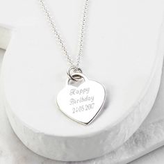 "This wonderful Sterling Silver Heart Necklace make a fantastic gift for friend and family of all ages.  The luxurious polished finish makes the pendant perfect for engraving a name, date or short message on. Maximum 25 characters fits best  To order this necklace simply select the chain length and the font you would like us to use from the drop down menus, you can select \"no engraving\" if you would like us to leave it blank. Then at the checkout enter the message you would like us to engrave in the \"note to seller\" box. Both the pendant and the chain are made from sterling silver. The heart pendant measures 2.5cm x 2cm. All of our jewellery comes in a gift box with a blank gift card." Sterling Silver Birthday Name Necklace With Heart Pendant, Silver Name Necklace For Anniversary, Sterling Silver Name Necklace With Heart Pendant For Birthday, Silver Name Necklace For Anniversary Gift, Silver Name Necklace With Engraved Text For Gift, Silver Heart Pendant Necklace For Birthday, Silver Heart Charm Necklace For Birthday Gift, Birthday Silver Name Necklace With Heart Charm, Silver Birthday Name Necklace With Heart Charm