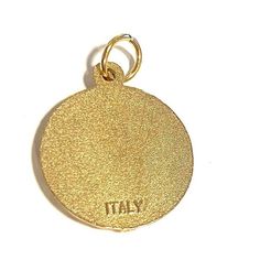 Beautiful medal. Perfect pendant for your rosary or your bracelet. Special item!Made of light brass alloy (golden color)Size : about 3/4"Made in Italy. Lifetime guarantee; brass metal finish will not tarnish.This auction includes an organza bag to store your keepsake.This medal, like most of my items, can be blessed by Pope Francis during public mass in Saint Peter's Square during Sunday Angelus.Just ask!Comes with a holy card of the blessing by Pope Francis! Personalized Gold Spiritual Jewelry And Charms, Personalized Gold Medallion Charms, Symbolic Gold Round Pendant Charms, Gold Symbolic Engraved Charms, Gold Metal Charms With Logo, Gold Metal Round Pendant Charms, Gold Spiritual Charms And Jewelry, Symbolic Gold Metal Charms, Nickel Free Gold Spiritual Charms