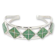 Jay King Gallery Collection Alicia Turquoise Inlay Cuff Bracelet  Gorgeous, green Alicia turquoise inlaid in a fun, geometric design, gives this handcrafted, sterling silver cuff bracelet a chic, contemporary vibe. From Jay's exclusive Gallery Collection.       Approx. 6-3/4"L x 3/4"W; fits 6" to 7" wrist     Stamped .925     Split-top cuff bracelet has green turquoise triangles inlaid in square pattern across top     Sides taper to ends   Stone Information       All sizes and weights approximat Split Top, Color Bands, Sterling Silver Cuff Bracelet, Sterling Silver Cuff, Square Pattern, Silver Cuff Bracelet, Green Turquoise, Silver Cuff, Men Necklace